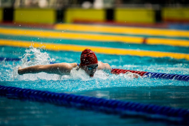 Swimming club member in pool